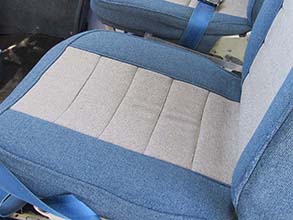 Blue cloth aircraft seat